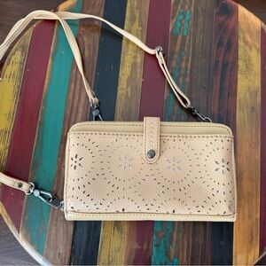 The Sak Laser-Cut Convertible Crossbody Wallet.